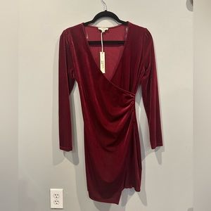 Flattering wrap deep red velvet dress.
